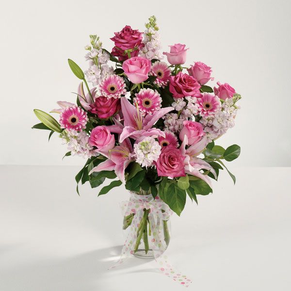 Pink mother's day bouquet with a polka dot ribbon